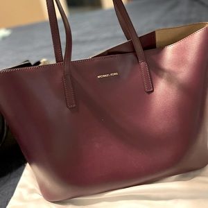 Michael Kors purse with matching wallet. Lightly used, in great shape.